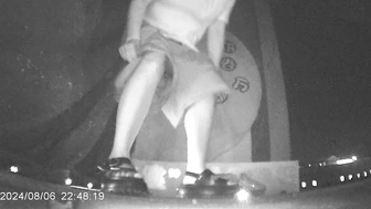 Desperate Chinese girl peeing in a hidden corner of a night market with no toilet