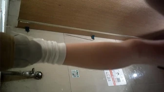 Little Sister Picks Up Tissues from Trash